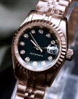 Ladies rose gold Band with Black dial