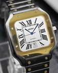 Santos mod watch with two tone gold dial and stainless steel case