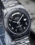 Black Arabic Seiko day-date mod with fluted bezel and jubilee bracelet