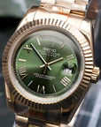 Dark Green dial with gold band