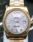 White gold arabic dial with gold band