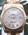 White rose gold arabic dial with gold band