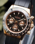 Seiko watch with black and rose gold design on a dark background