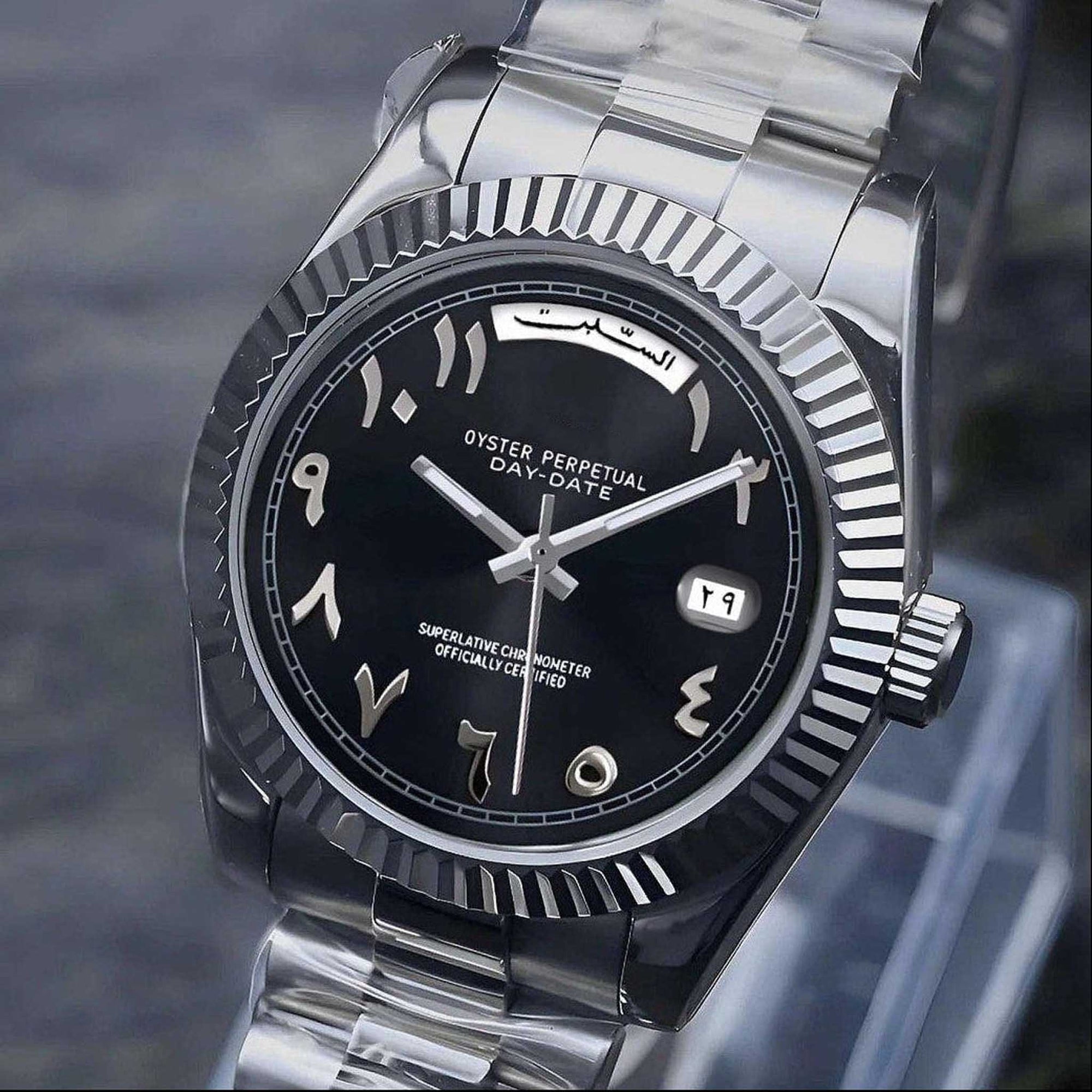 Black Arabic Seiko day-date mod with fluted bezel and jubilee bracelet
