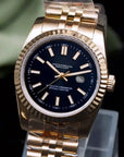 31mm Black dial with Rose Gold Band