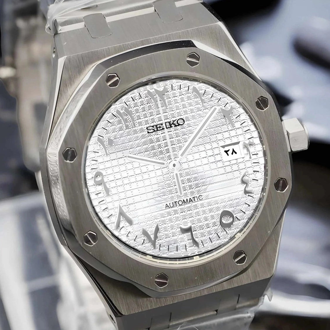 White Arabic dial with Silver Band