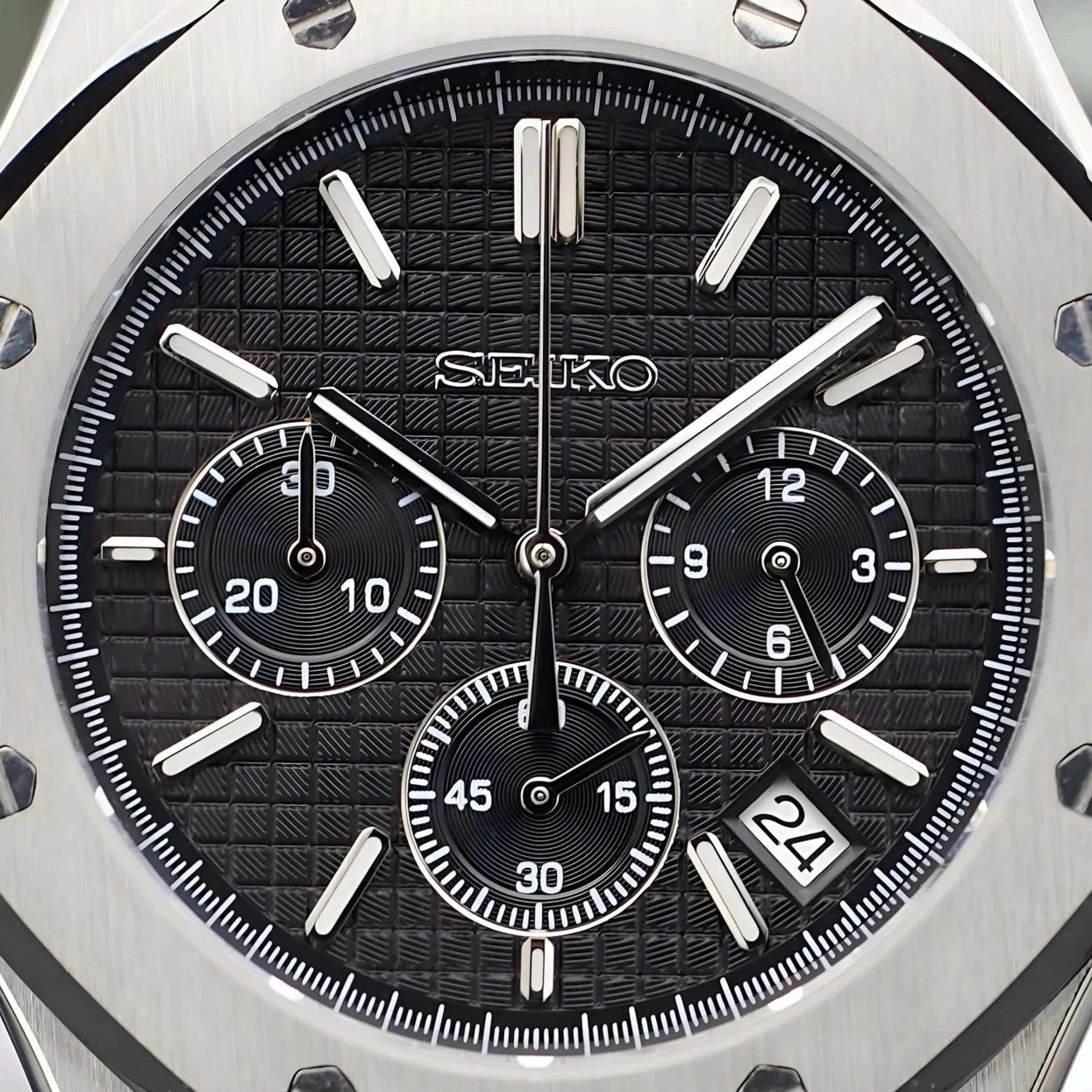 Luxury watch with black dial and silver case