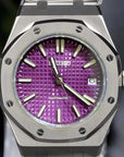 Watch with purple face and silver case on a clear stand