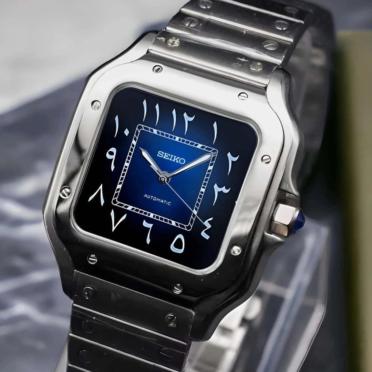 Santos mod watch with blue arabic dial and stainless steel case