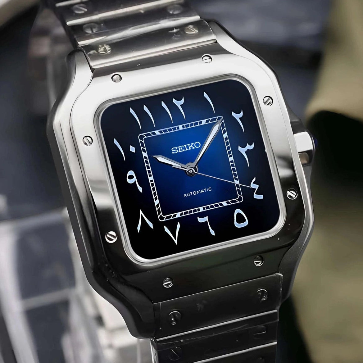 Santos mod watch with blue arabic dial and stainless steel case