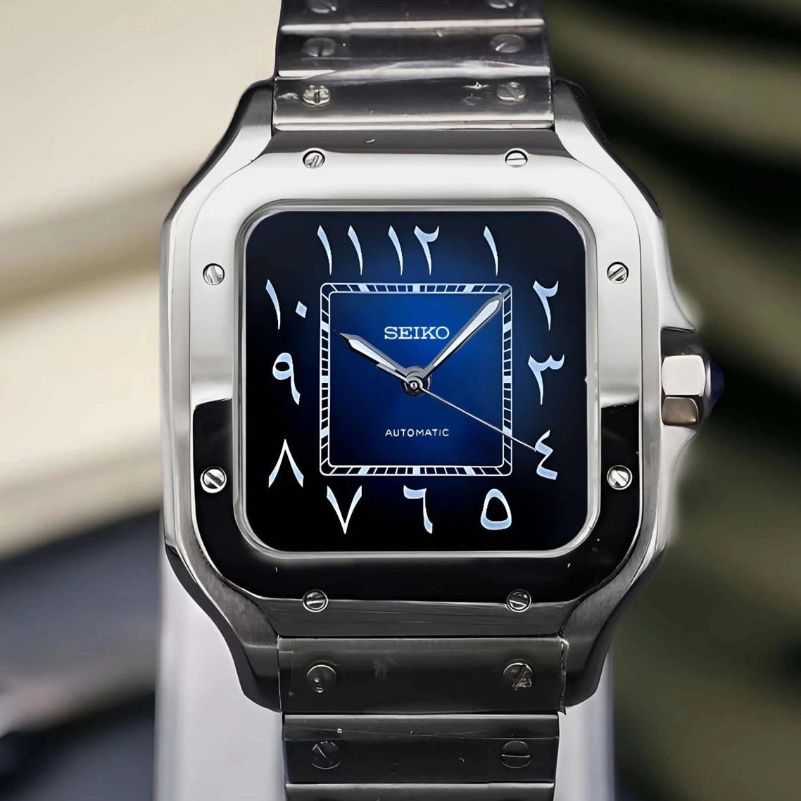 Santos mod watch with blue arabic dial and stainless steel case