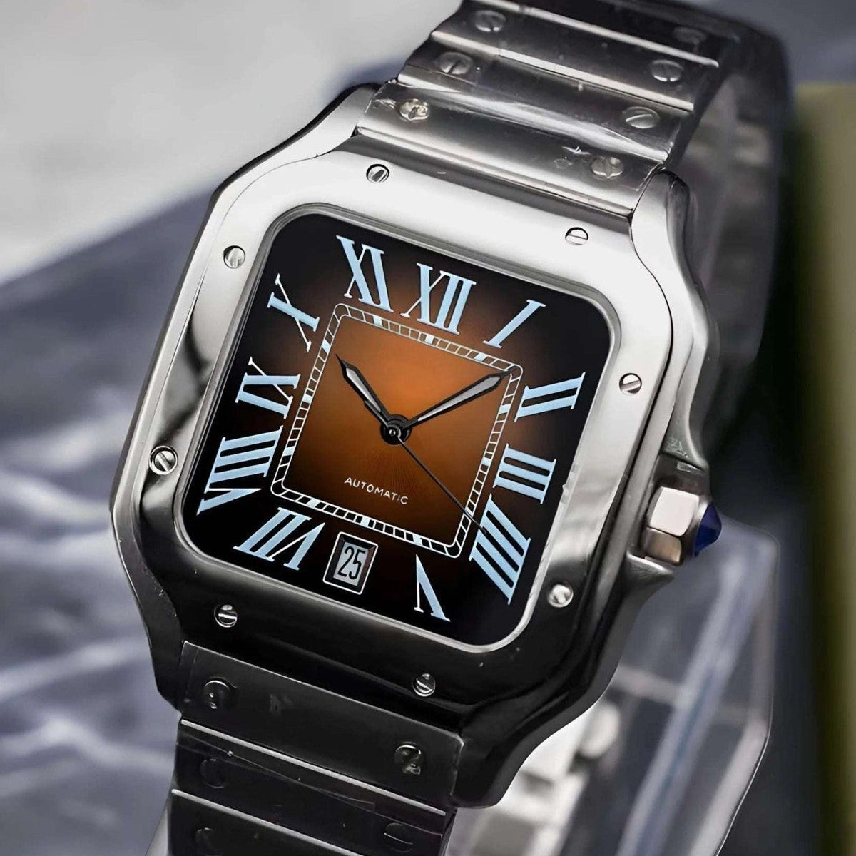 Silver watch with brown face on a stand