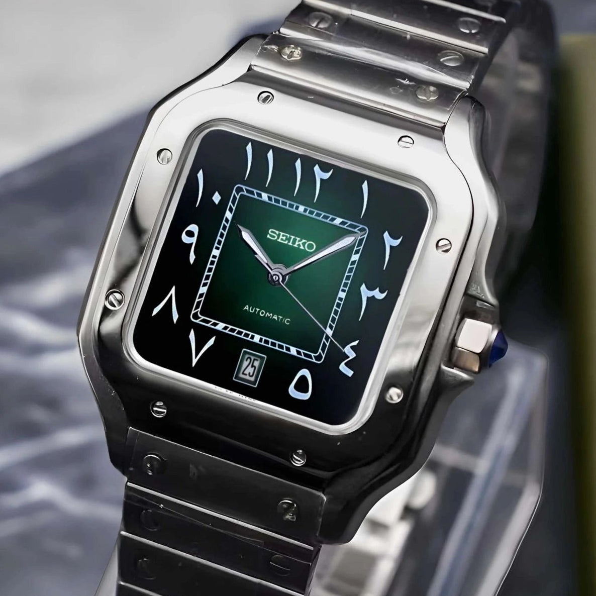 Santos mod watch with green arabic dial and stainless steel case
