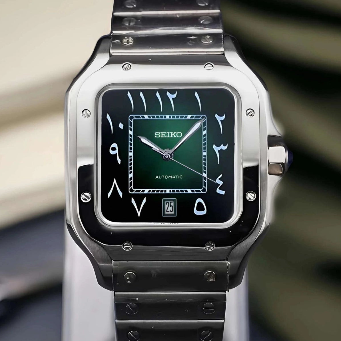 Santos mod watch with green arabic dial and stainless steel case