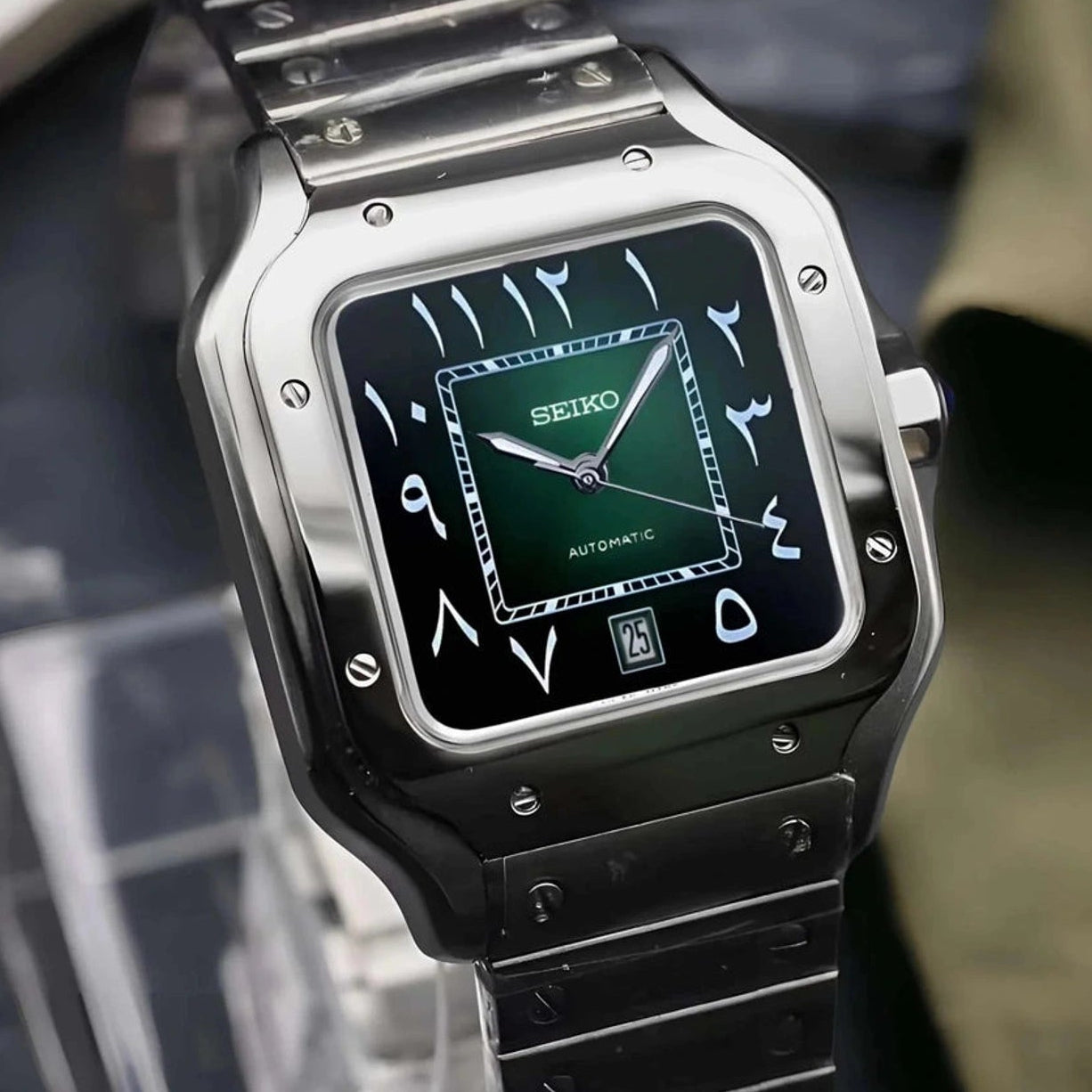 Santos mod watch with green arabic dial and stainless steel case