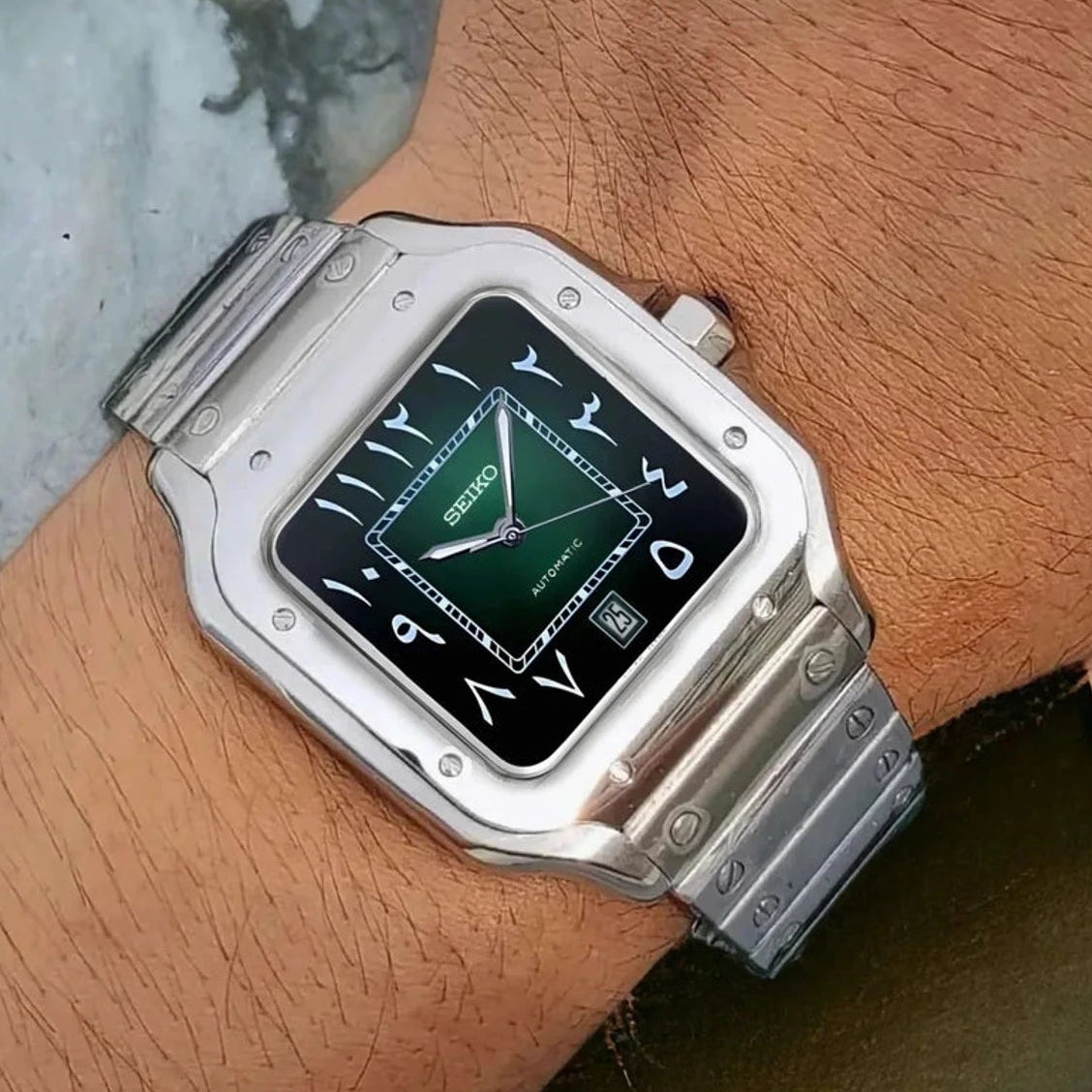 Santos mod watch with green arabic dial and stainless steel case
