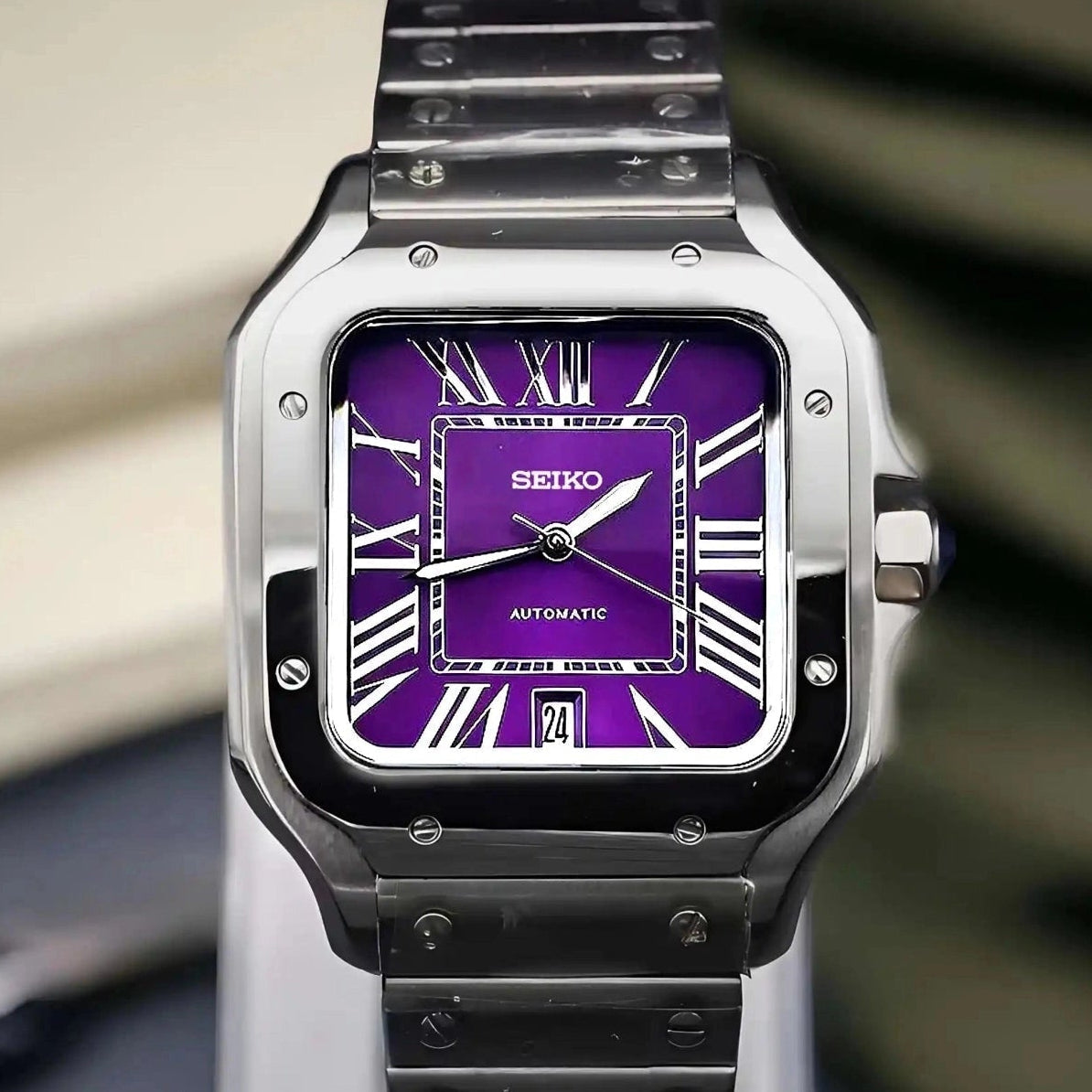 Santos mod watch with purple dial and stainless steel case