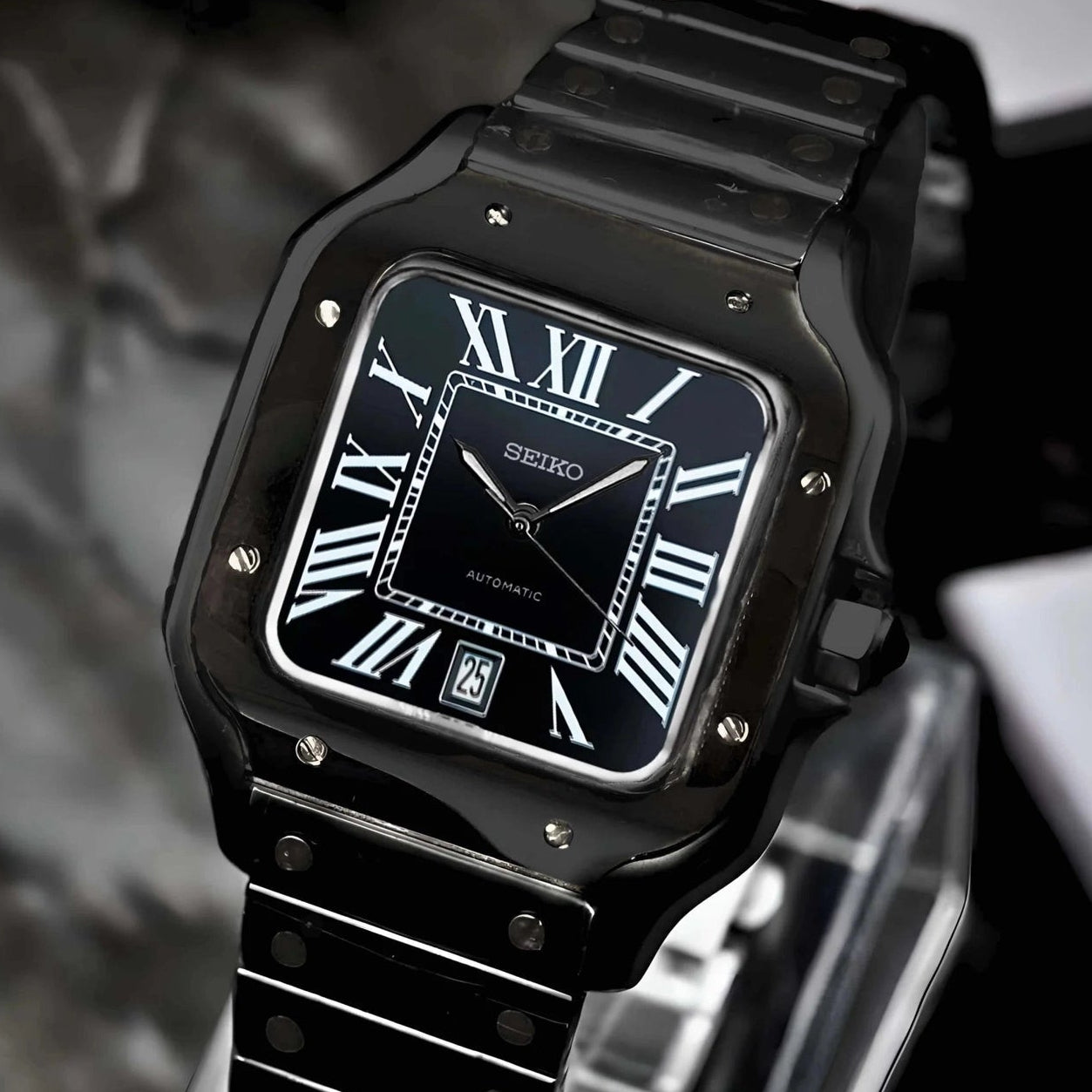 Santos mod watch with triple black dial and stainless steel case