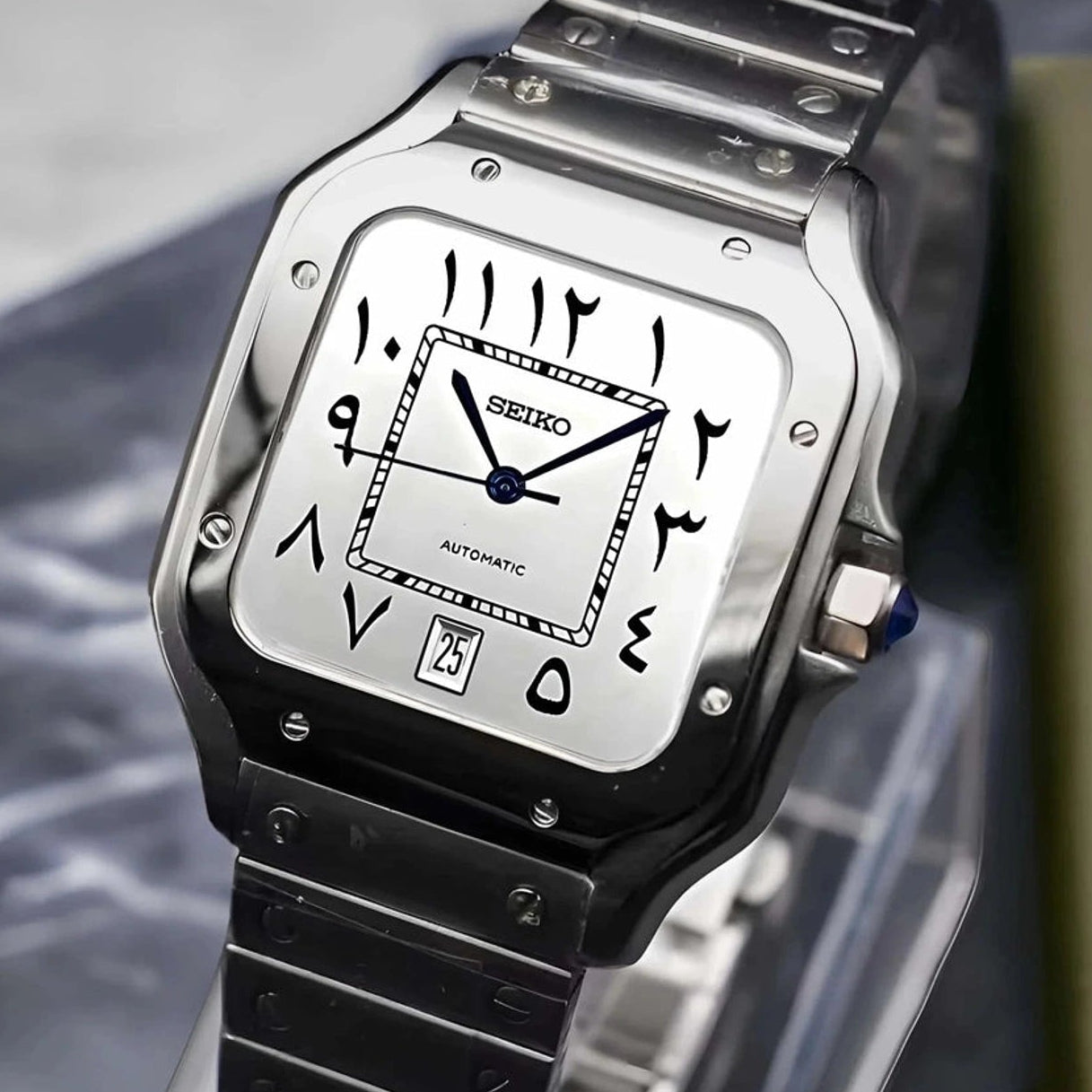 Santos mod watch with white arabic dial and stainless steel case