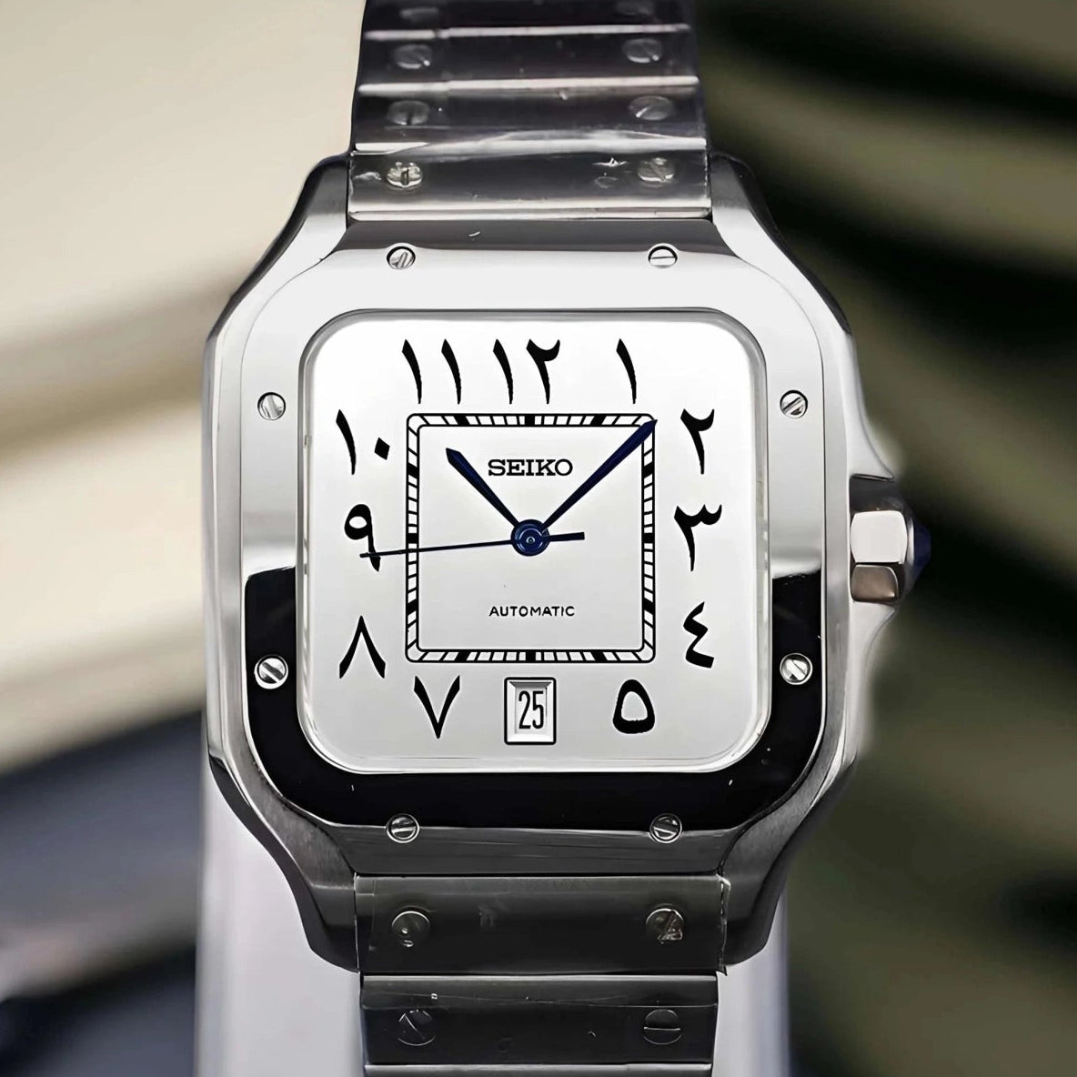 Santos mod watch with white arabic dial and stainless steel case