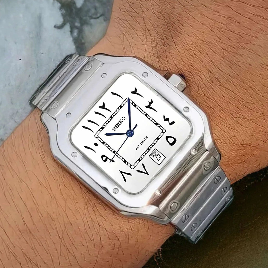 Santos mod watch with white arabic dial and stainless steel case