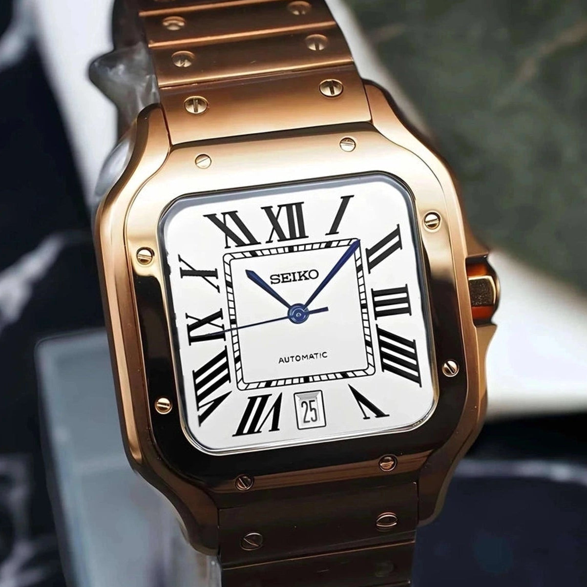 Santos mod watch with white rose gold dial and stainless steel case