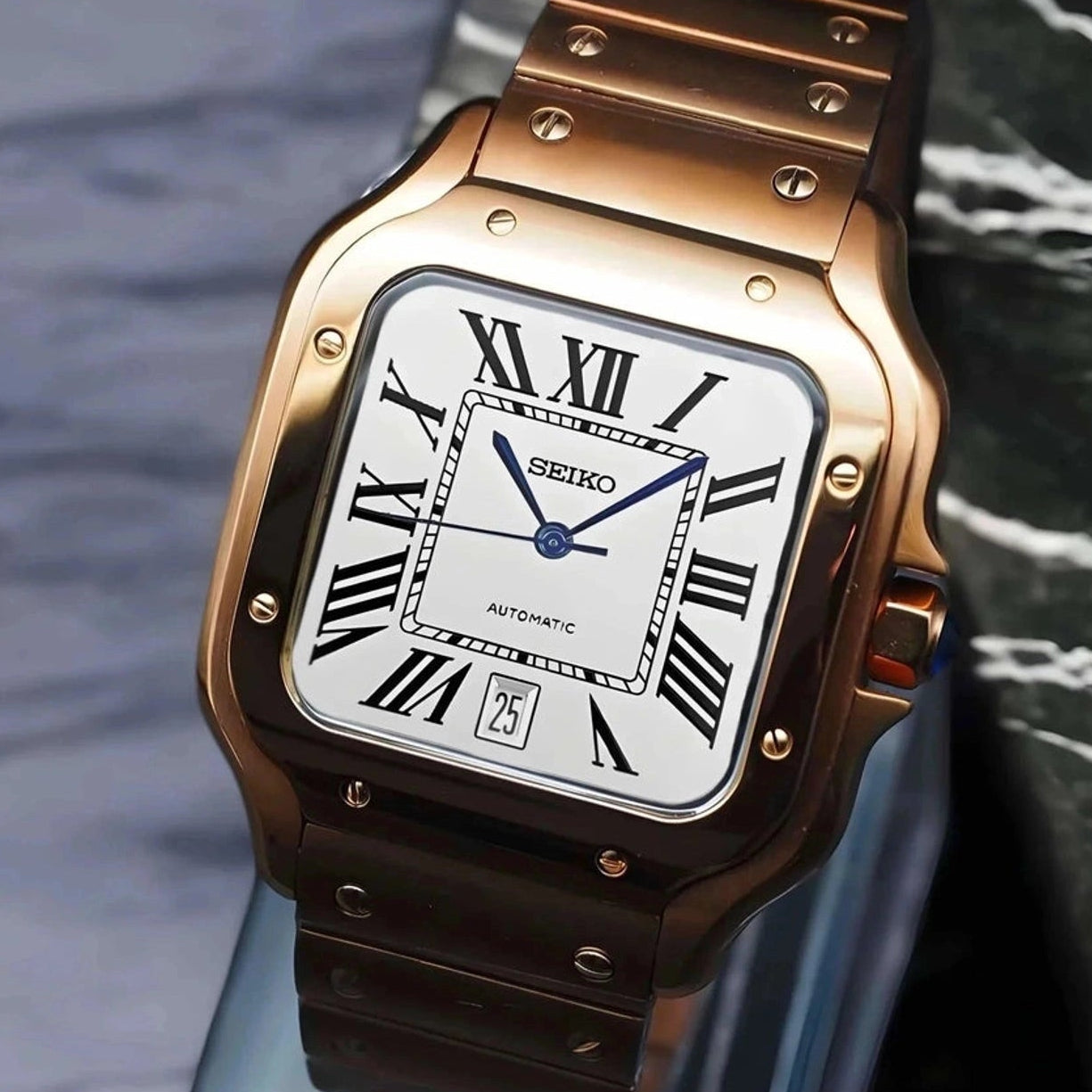 Santos mod watch with white rose gold dial and stainless steel case