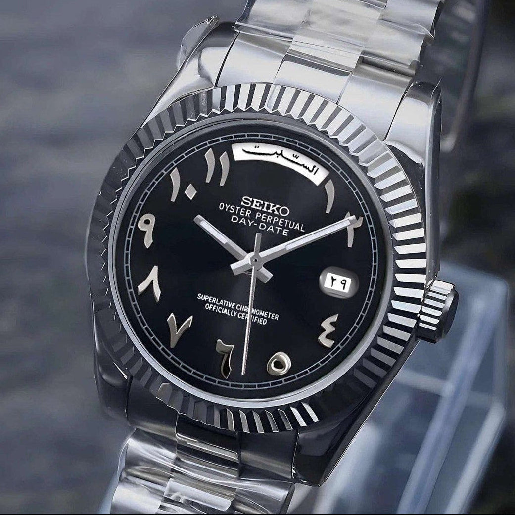 Black Arabic Seiko day-date mod with fluted bezel and jubilee bracelet