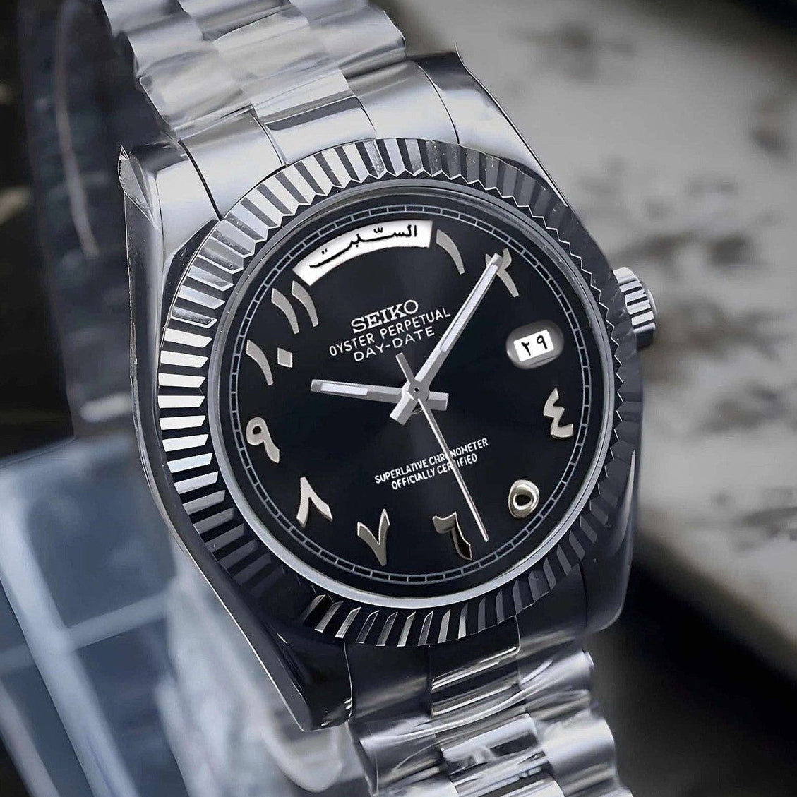 Black Arabic Seiko day-date mod with fluted bezel and jubilee bracelet