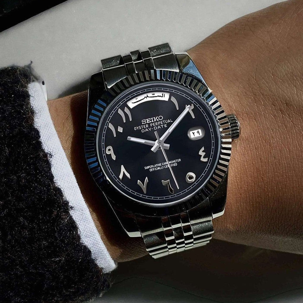 Black Arabic Seiko day-date mod with fluted bezel and jubilee bracelet