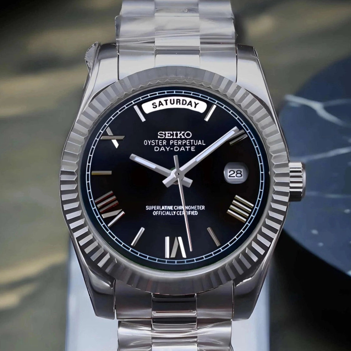 Day Date Black Roman dial with Silver band