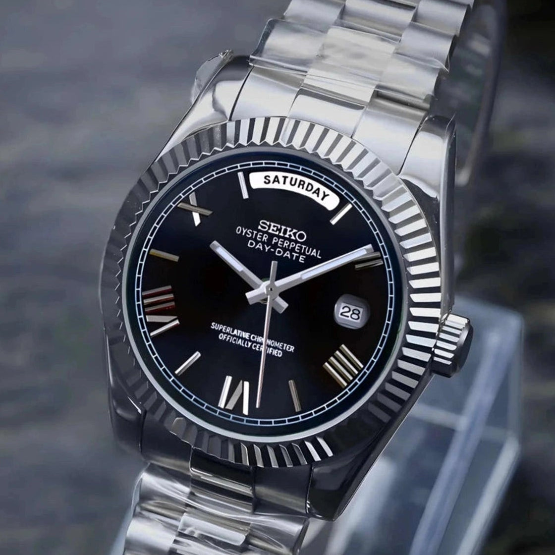 Day Date Black Roman dial with Silver band