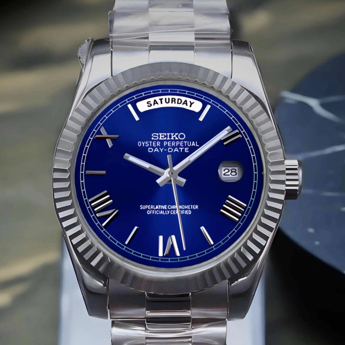 Blue Roman dial day date watch with silver band