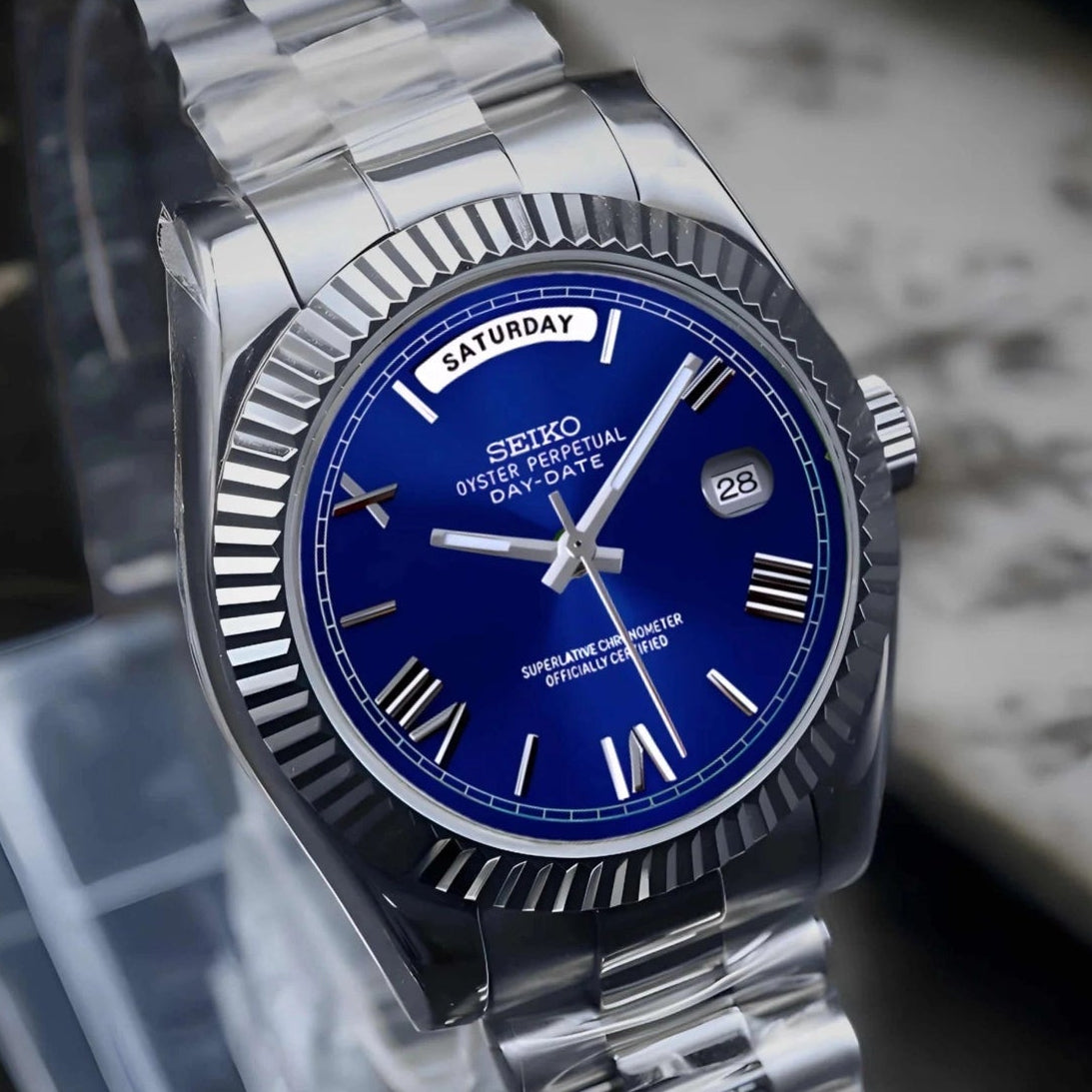 Blue Roman dial day date watch with silver band