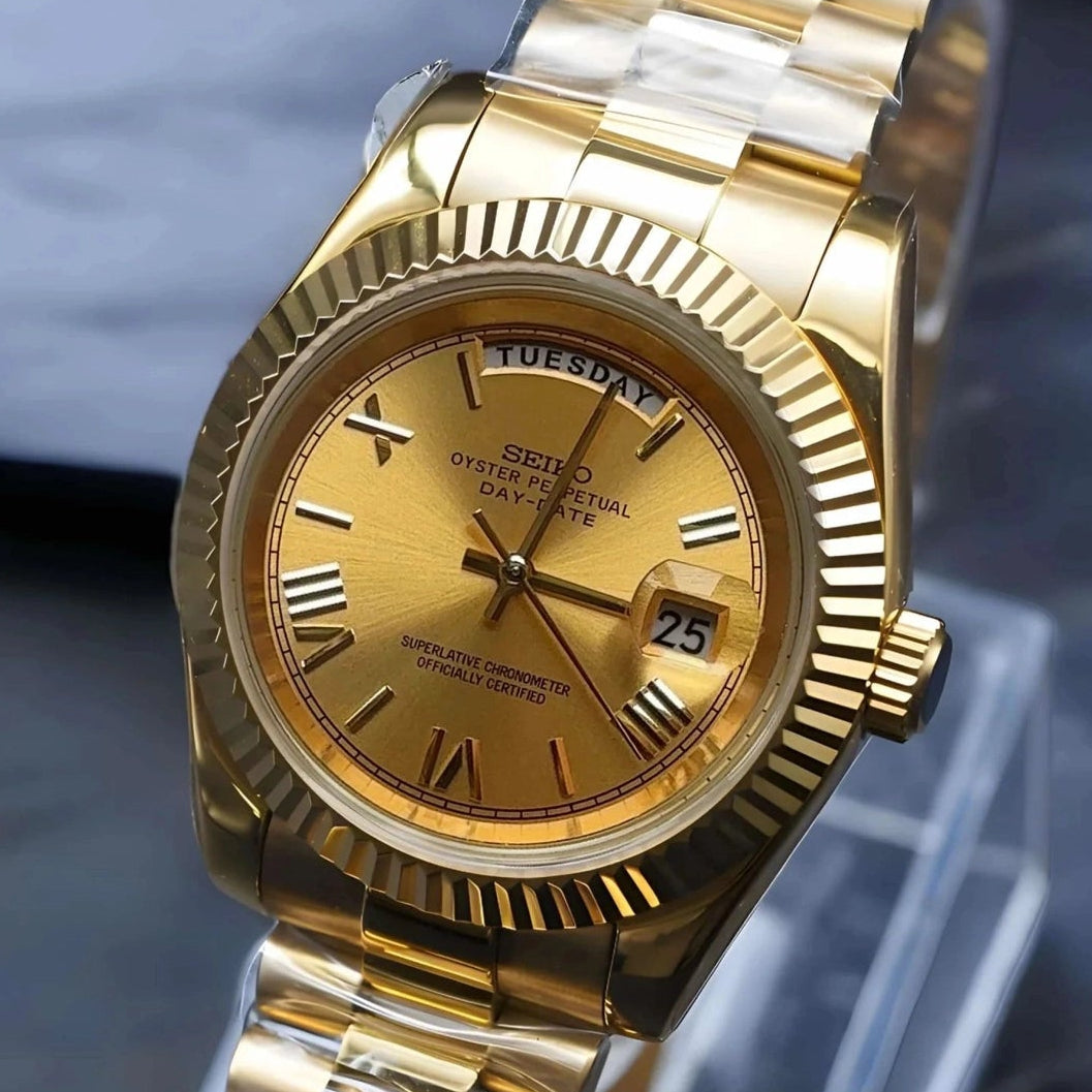 Day date Gold dial watch with gold band