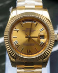 Day date Gold dial watch with gold band