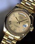 Day date Gold dial watch with gold band