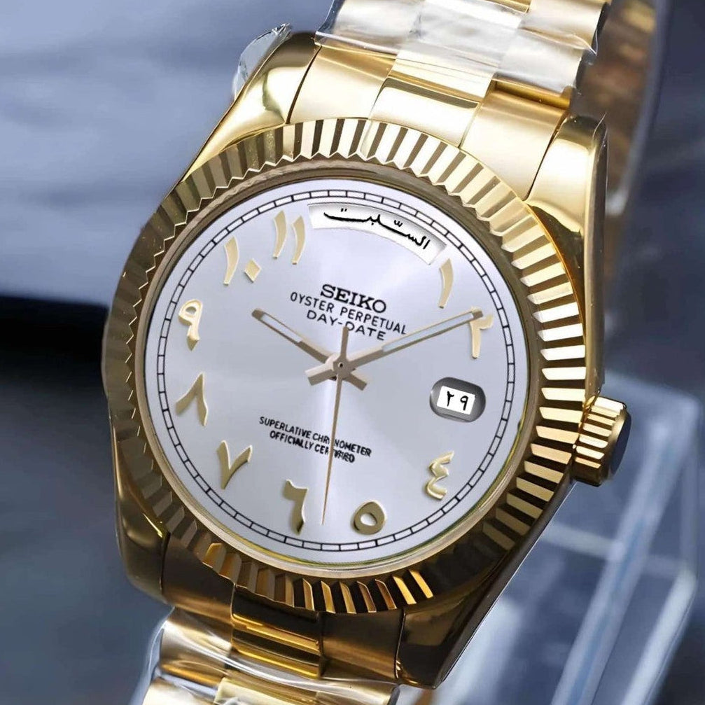 White gold arabic dial with gold band