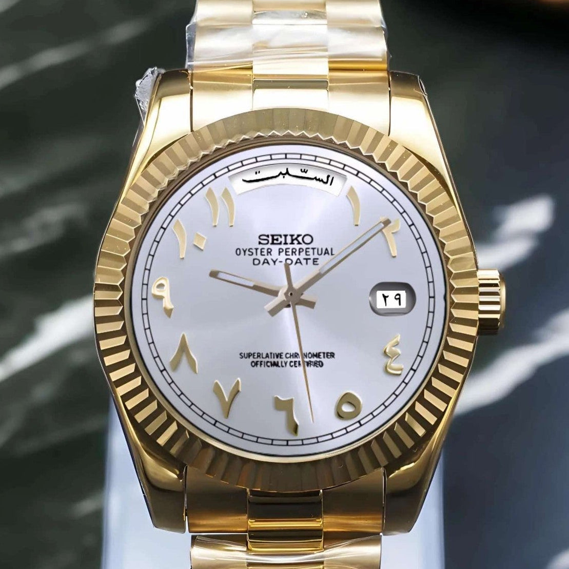 White gold arabic dial with gold band