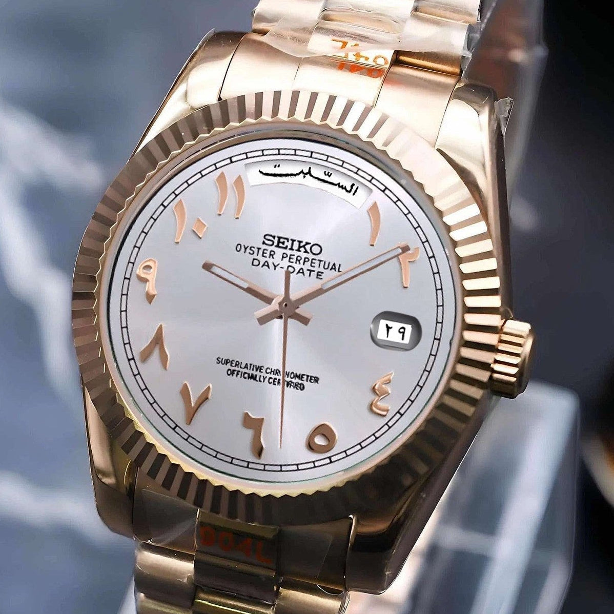 White rose gold arabic dial with gold band