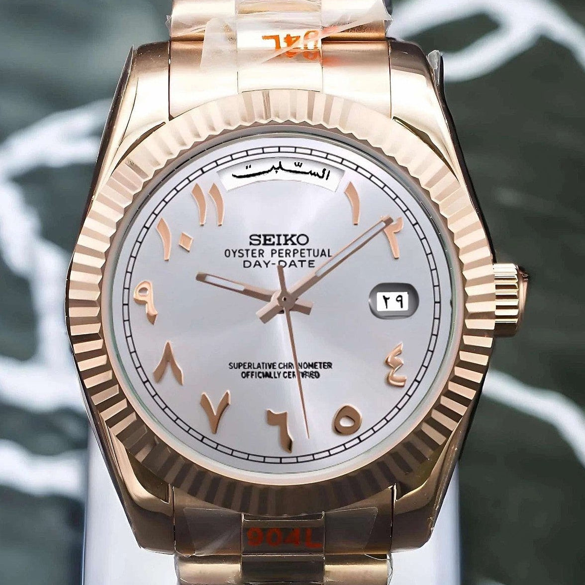 White rose gold arabic dial with gold band