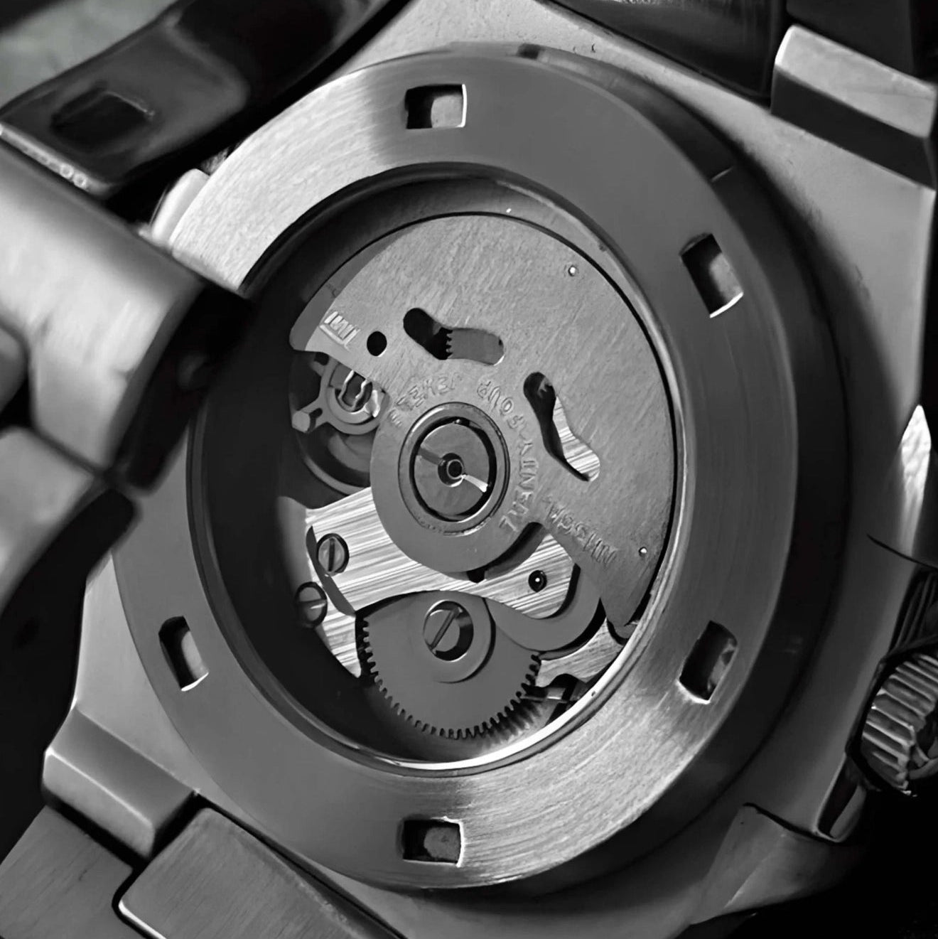 Close-up of a watch mechanism on a dark background