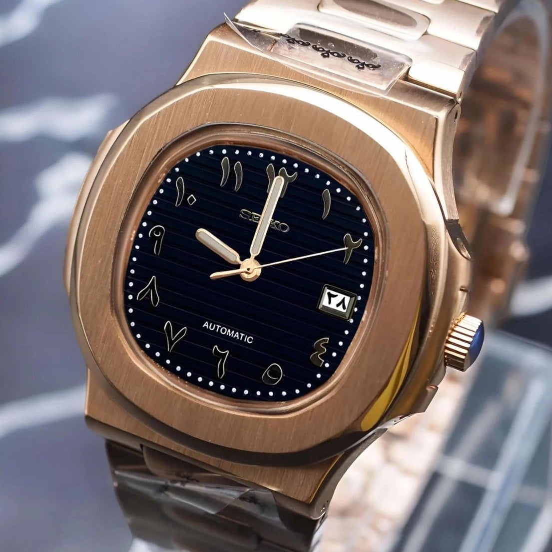 Black dial with rose gold Band