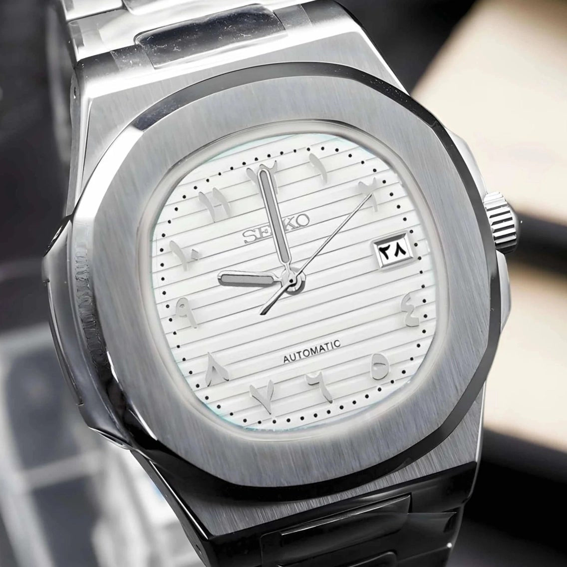 Arabic White dial with silver band